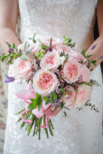 Pink roses in a wedding bouquet