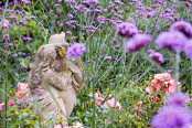 Statue set amongst Verbena bonariensis